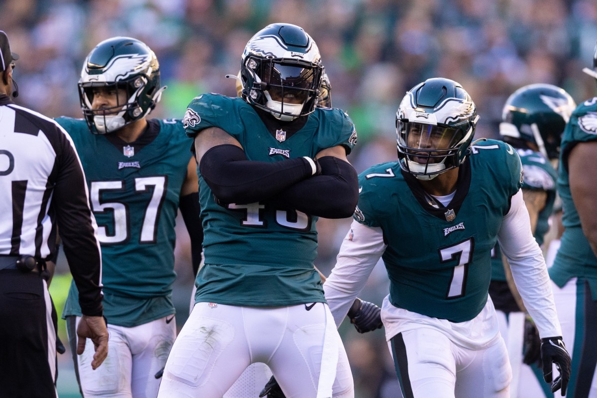 Jan 1, 2023; Philadelphia, Pennsylvania, USA; Philadelphia Eagles linebacker Kyzir White (43) celebrates with linebacker Haason Reddick (7) after a defensive stop against the New Orleans Saints during the fourth quarter at Lincoln Financial Field.
